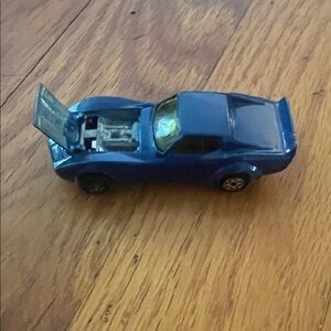 Sleek Blue Toy Car with Opening Hood